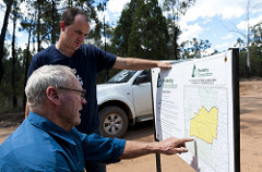 Tony Pickard shows Jeremy Buckingham forestry map
